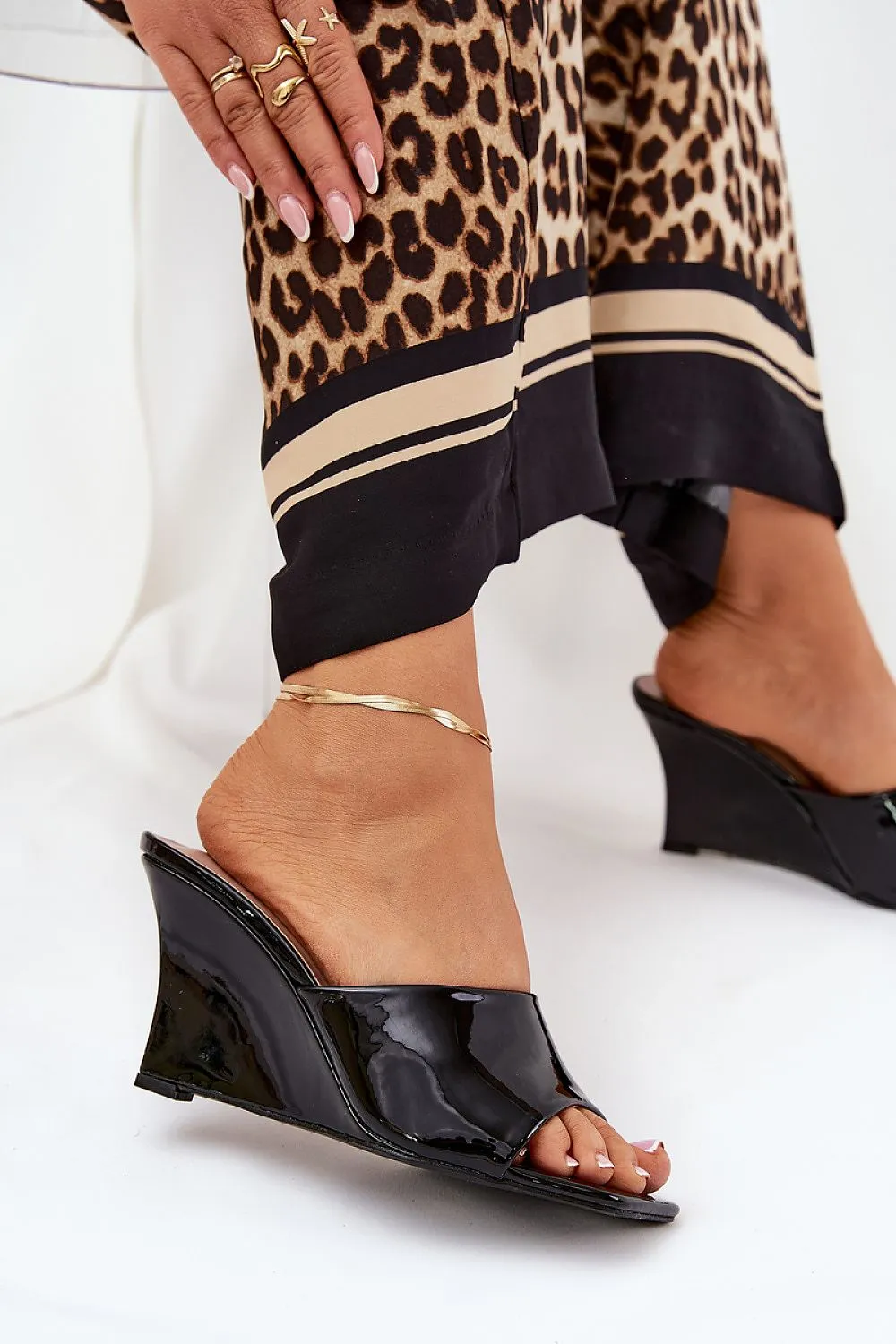 Stylish tapered wedge heel clogs
