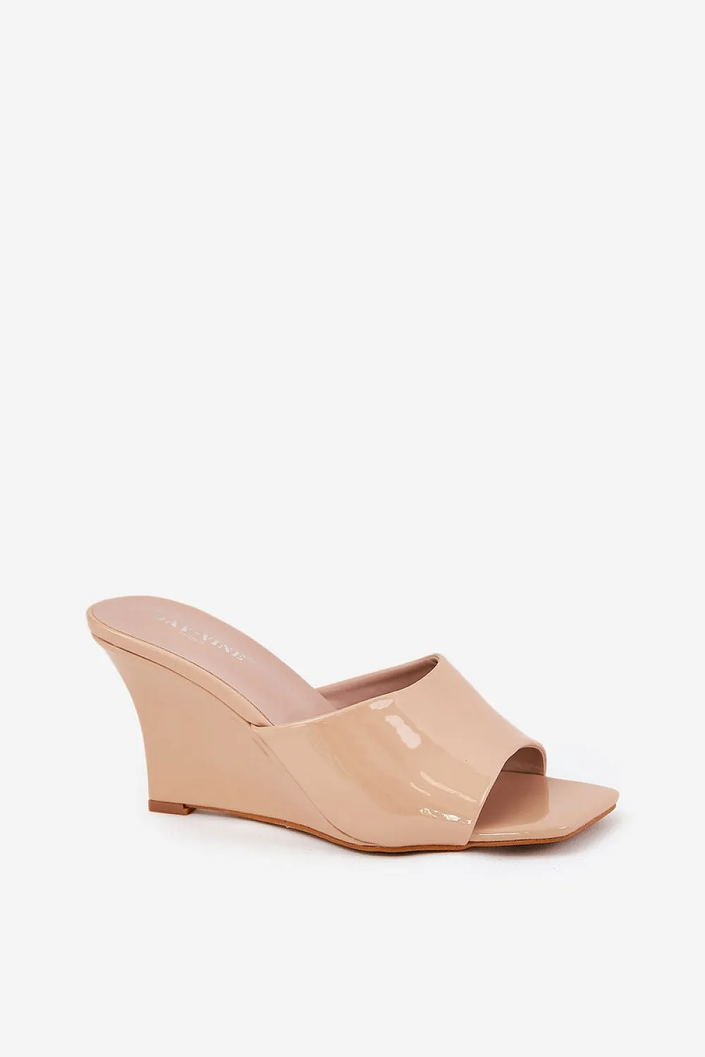 Stylish tapered wedge heel clogs