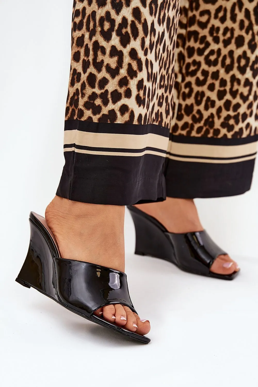 Stylish tapered wedge heel clogs